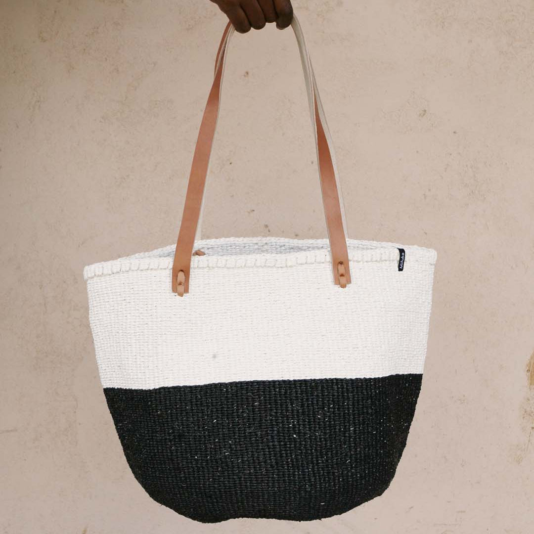 Mifuko Partly recycled plastic and sisal Shopper basket M Kiondo shopper basket | Black and white duo M handmade fair
trade leather handles