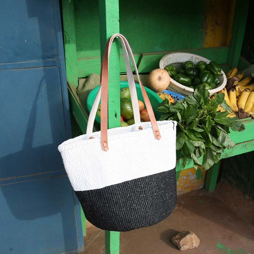 Mifuko Partly recycled plastic and sisal Shopper basket M Kiondo shopper basket | Black and white duo M handmade fair
trade leather handles