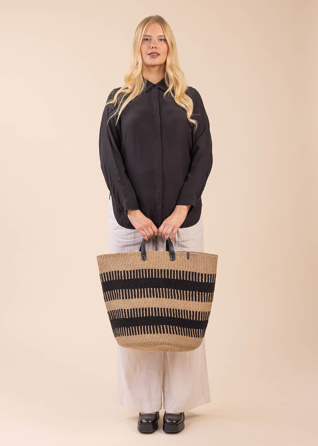 rib weave wool basket with black handles handmade fair trade