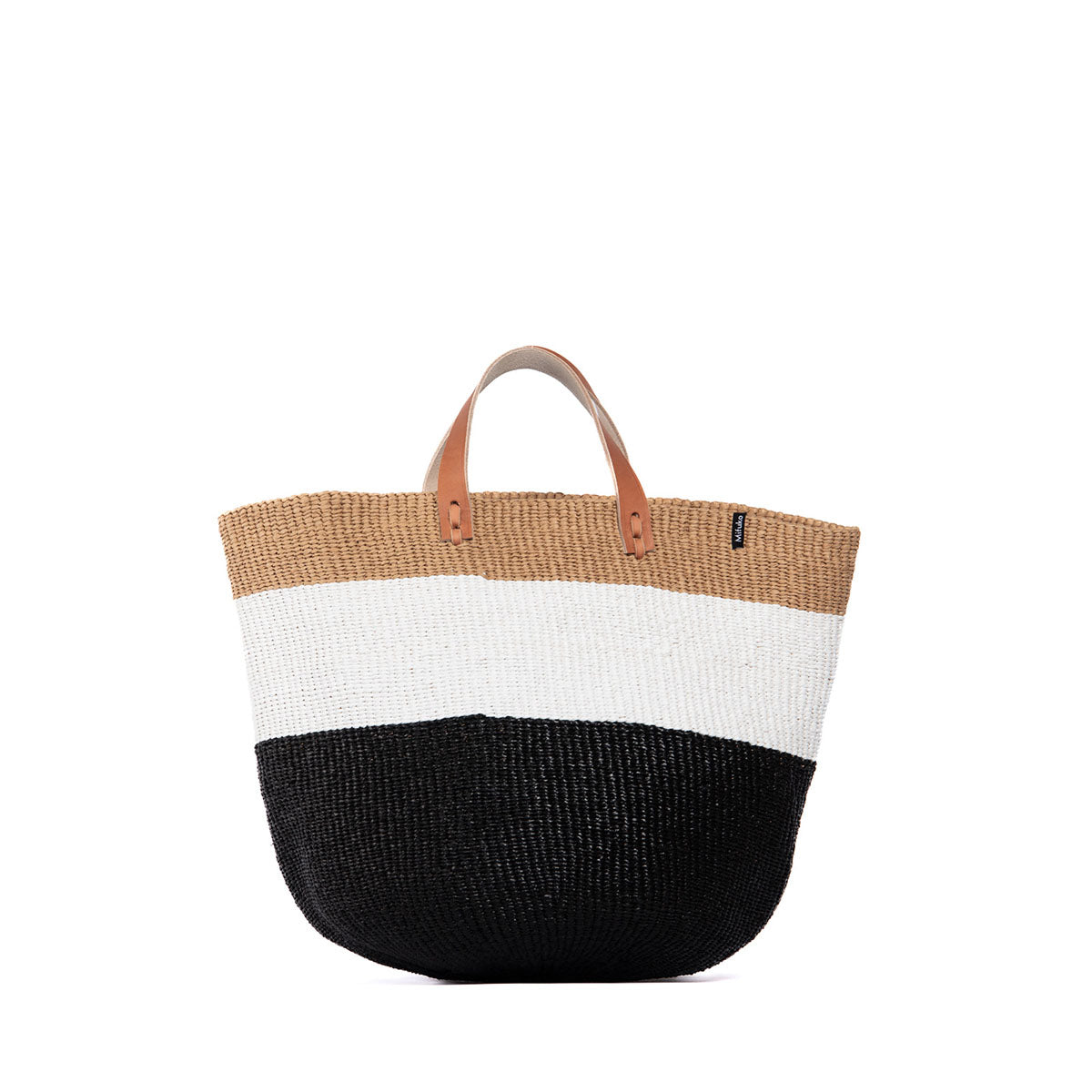 The Kiondo Market Basket in Duo Black is a stylish and sustainable accessory that combines functionality and modern design. Handwoven with care by skilled artisans, this medium-sized basket is crafted from a durable blend of FSC-certified paper and recycled plastic, making it lightweight, robust, and eco-friendly.