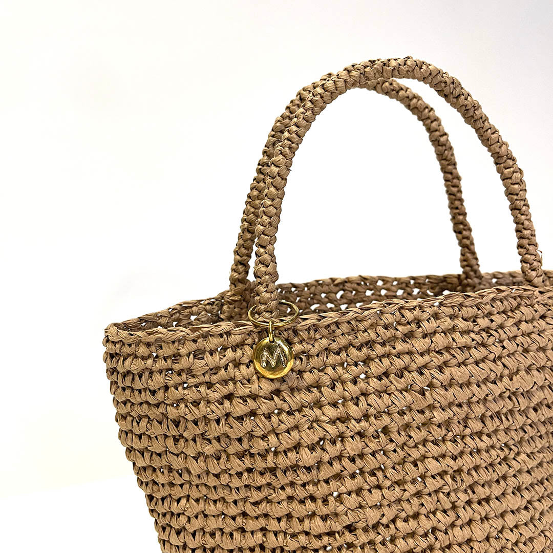 mifuko handbag brown crocheted mini bag handmade fair trade paper brass detail