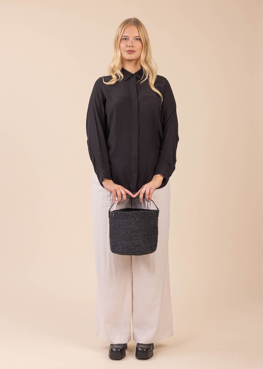 Small black basket with leather handle handmade fair trade