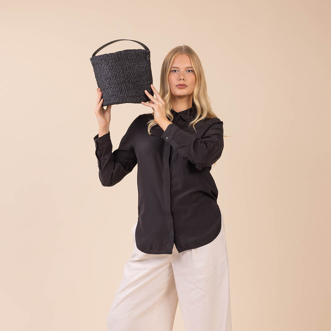 Small black basket with leather handle handmade fair trade