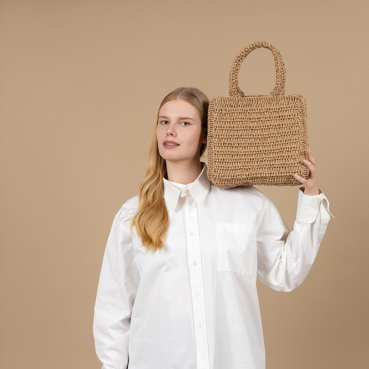 This beautifully hand-crocheted bag, combines artisanal skill with timeless design. Its unique texture and sustainable production make it a stylish and responsible choice for your everyday needs.
Materials: Carefully crocheted using high-quality, eco-friendly materials that ensure durability and sustainability.