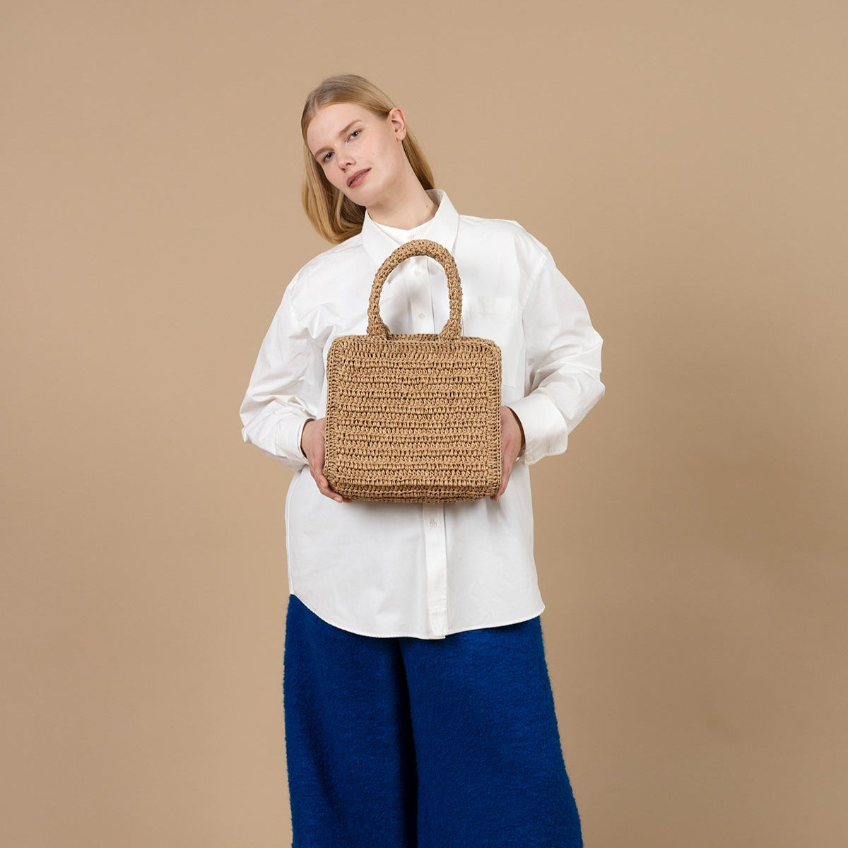 This beautifully hand-crocheted bag, combines artisanal skill with timeless design. Its unique texture and sustainable production make it a stylish and responsible choice for your everyday needs.
Materials: Carefully crocheted using high-quality, eco-friendly materials that ensure durability and sustainability.