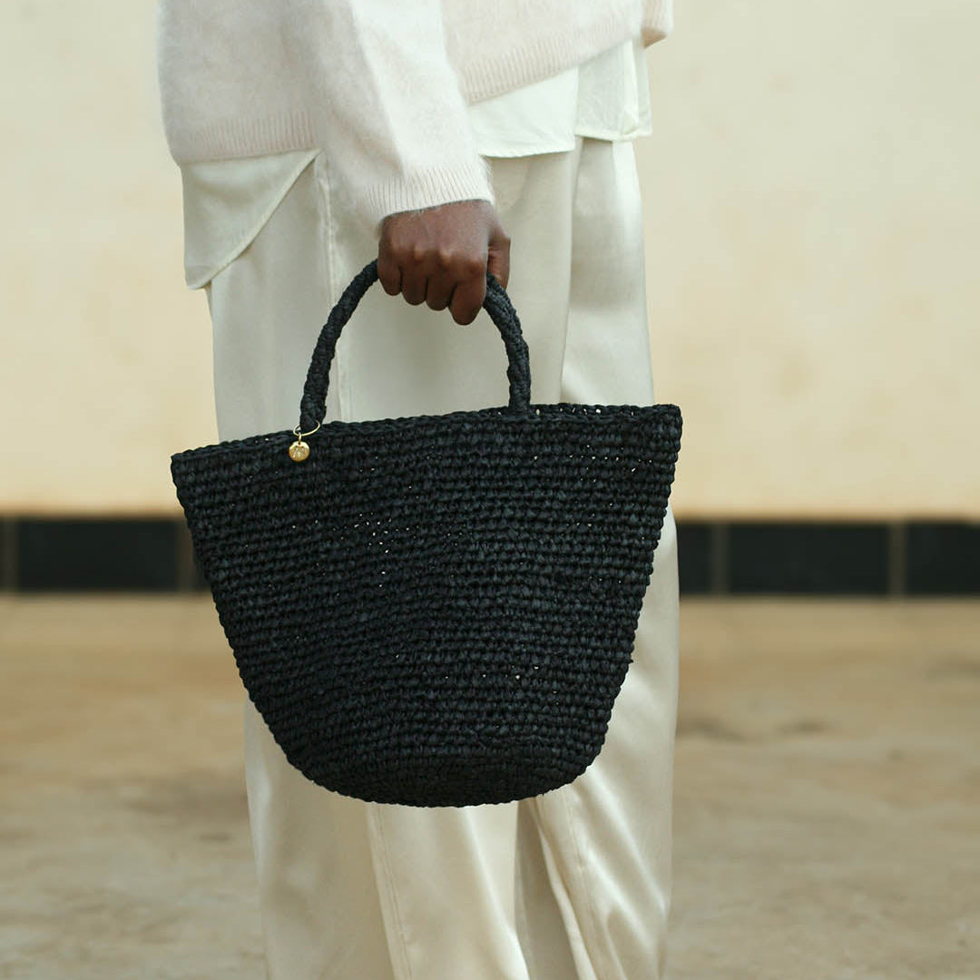 mifuko handbag black crocheted handmade fair trade paper brass detail