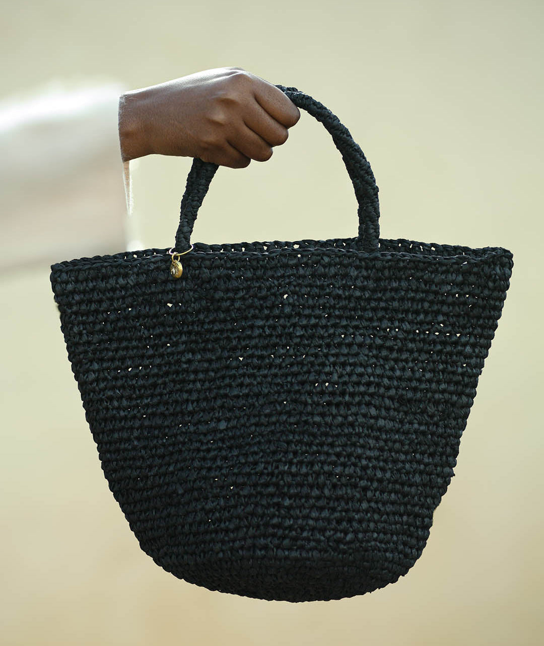 mifuko handbag black crocheted handmade fair trade paper brass detail