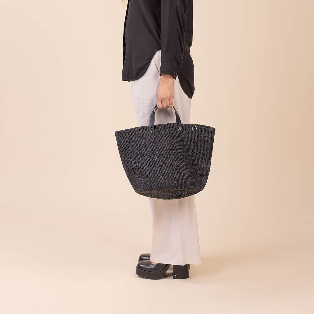 handmade black basket with leather handles fair trade