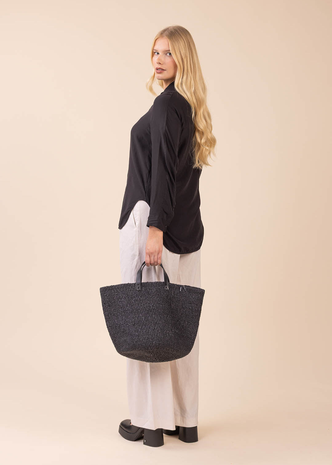 handmade black basket with leather handles fair trade