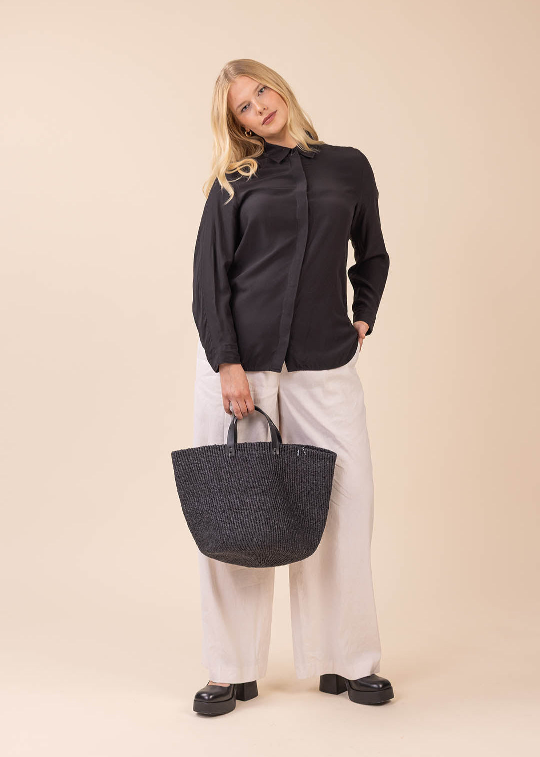 handmade black basket with leather handles fair trade