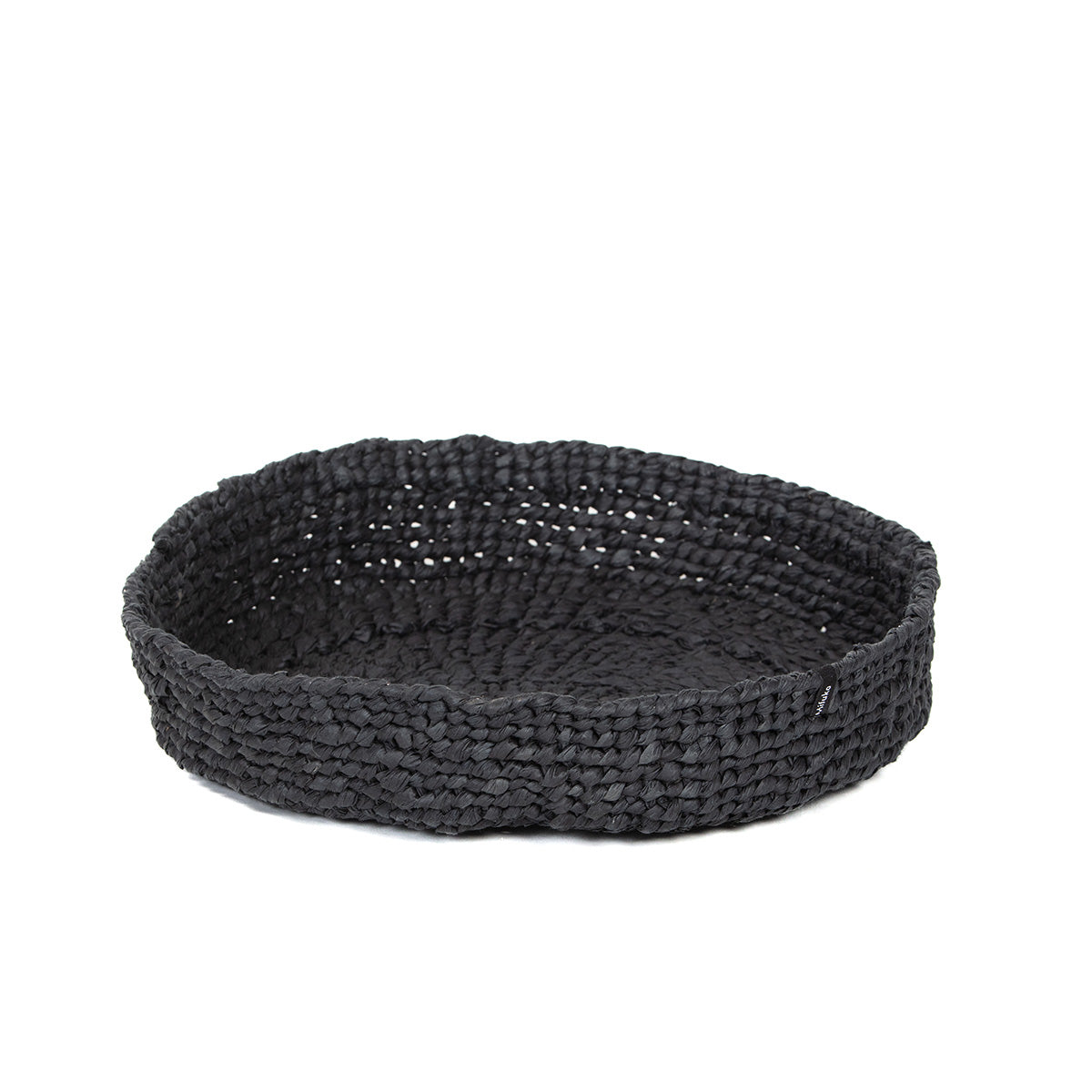 The Kiondo Bowl in Black is a beautifully handwoven piece that combines traditional craftsmanship with a sleek, modern design. Made from a durable blend of FSC-certified paper and recycled plastic, this medium-sized bowl is lightweight, strong, and eco-friendly.