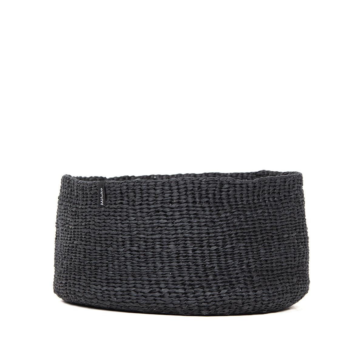 The Kiondo High Bowl in Black is a stunning and practical piece, designed for organizing small items in a sleek and sustainable way. Handwoven from FSC-certified paper, this small bowl is lightweight yet sturdy, combining eco-friendly materials with elegant design.