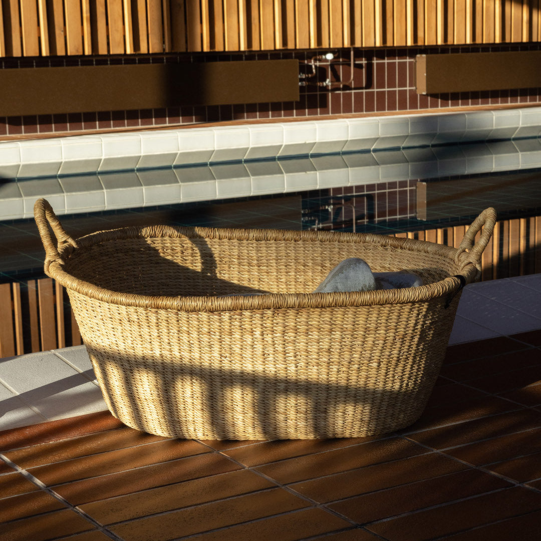 Beautiful handmade natural baskets for laundry or towels by the pool, fair trade