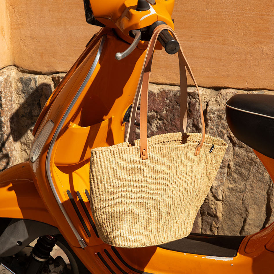 Oval shaped handmade fair trade bag with leather handles