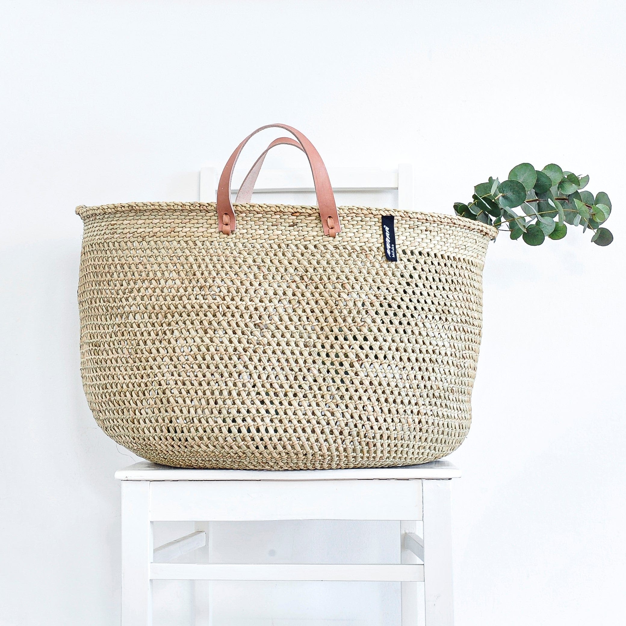 Handmade natural fibre floor basket fair trade