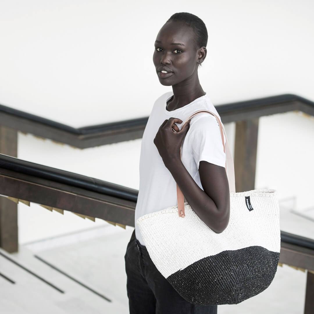 Mifuko Partly recycled plastic and sisal Shopper basket M Kiondo shopper basket | Black and white duo M handmade fair
trade leather handles