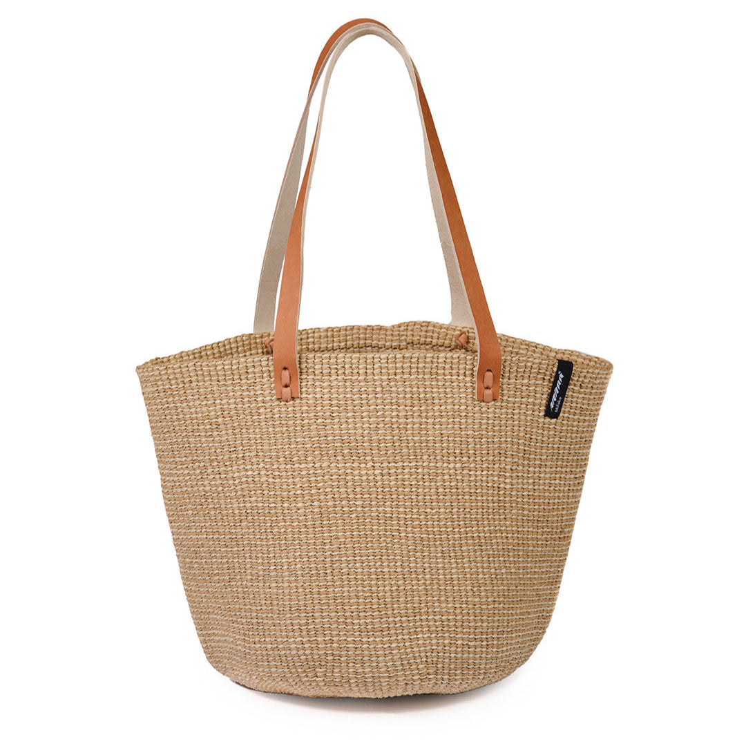 accessory. Handwoven with care from banana fiber and FSC-certified paper twine, it is lightweight, durable, and designed for everyday use.