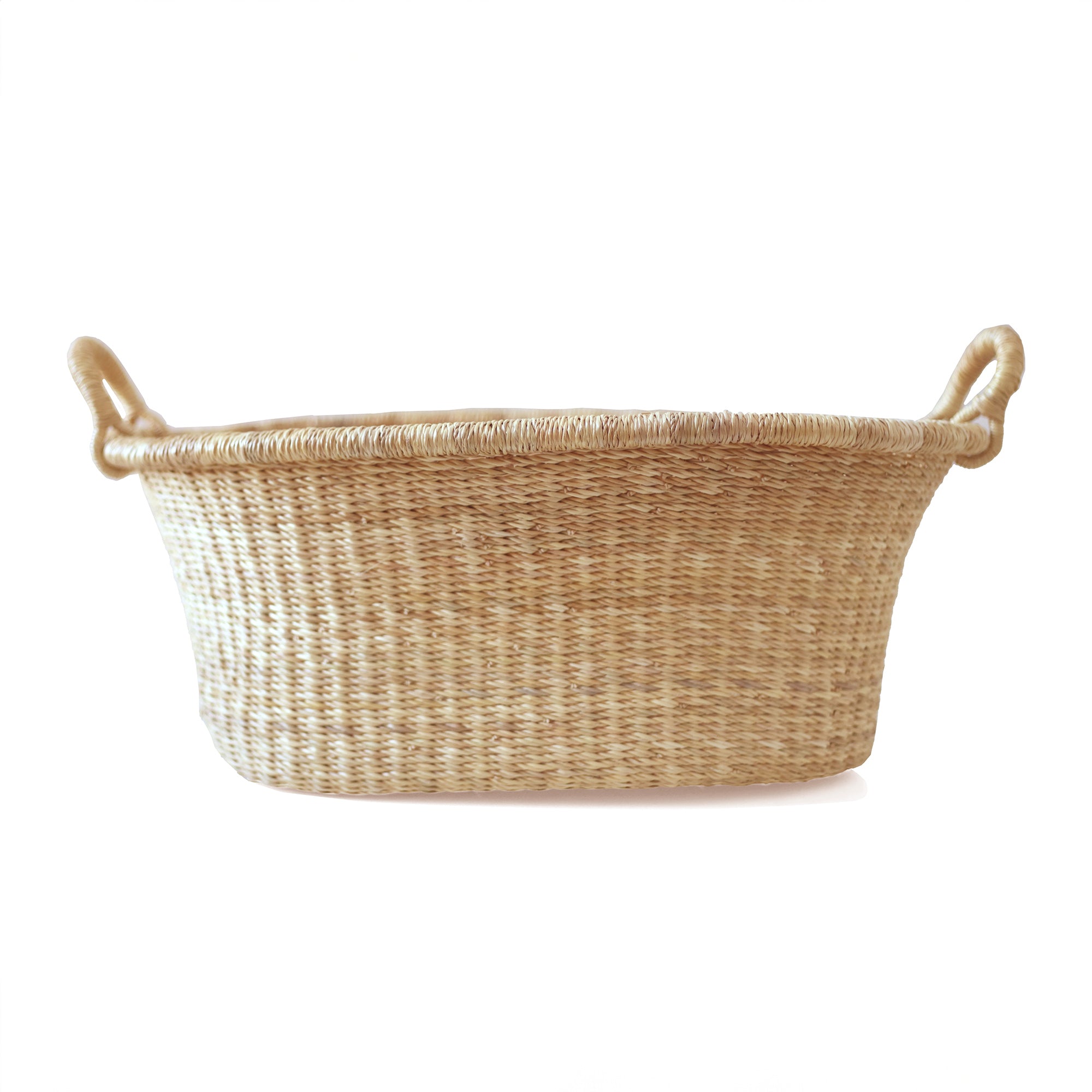 Woven basket with handles on a white background