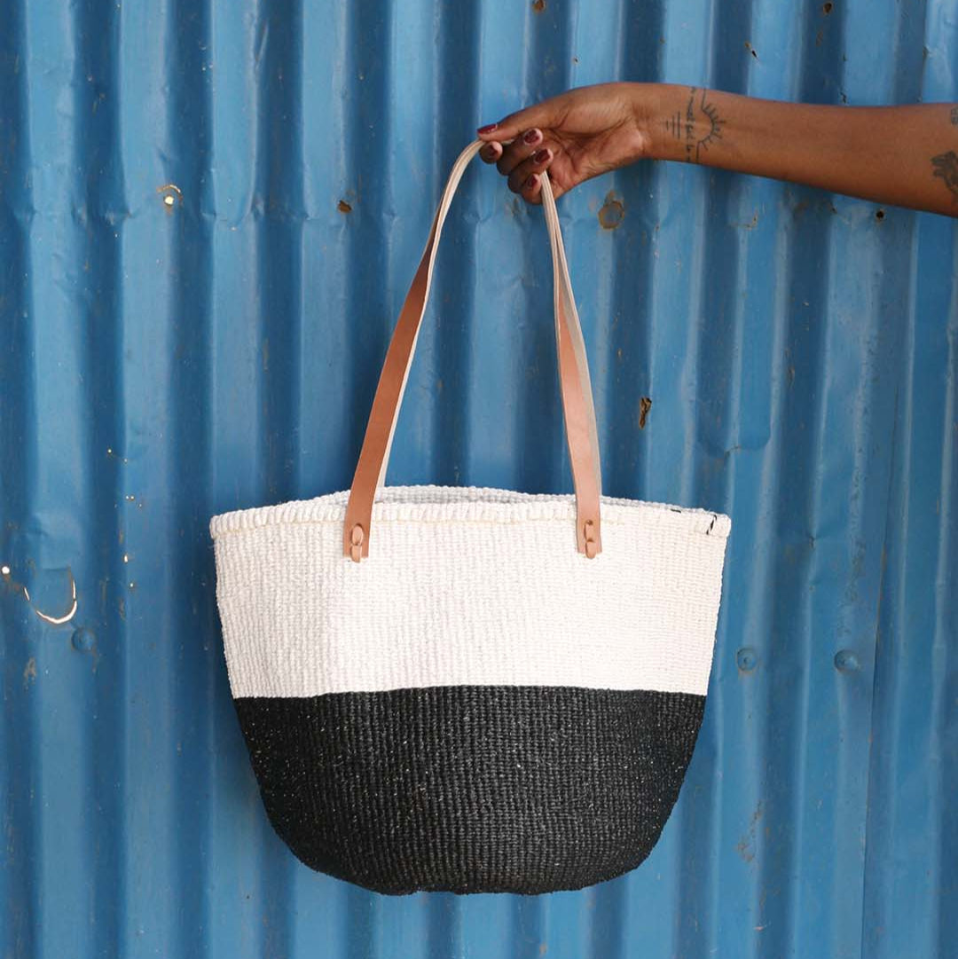 Mifuko Partly recycled plastic and sisal Shopper basket M Kiondo shopper basket | Black and white duo M handmade fair
trade leather handles