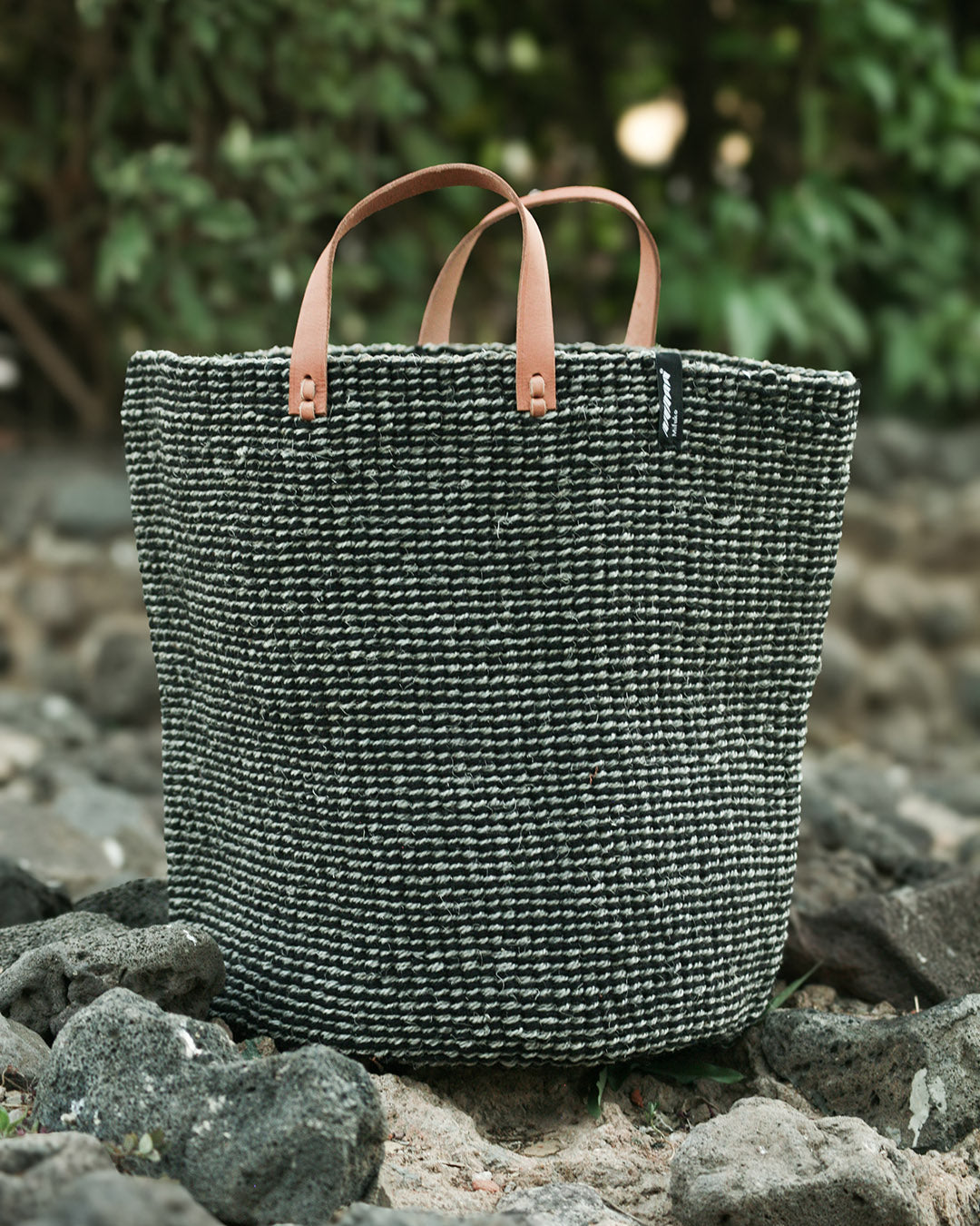 Beautiful grey sisal and wool basket woth leather handles