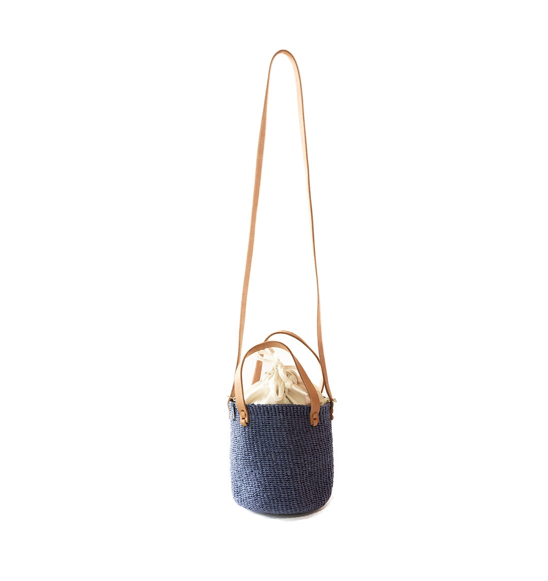Blue mini gross body bag on a white background, handwoven.