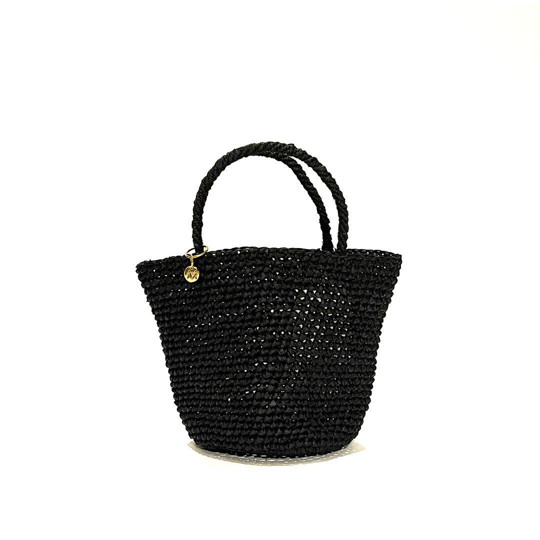 Black handmade  crocheted handbag on a white background