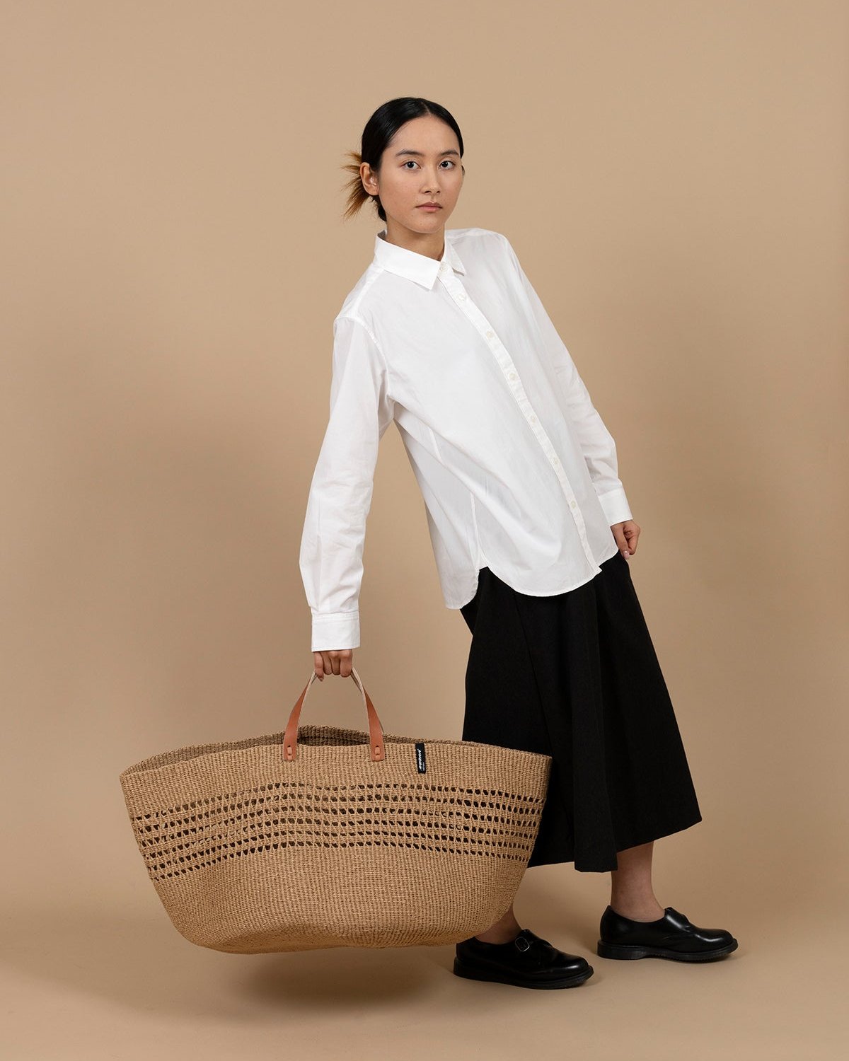 solution for your home. Handwoven with care by skilled artisans, this extra-large basket is crafted from FSC-certified paper, offering a lightweight yet durable design that is both functional and eco-friendly.