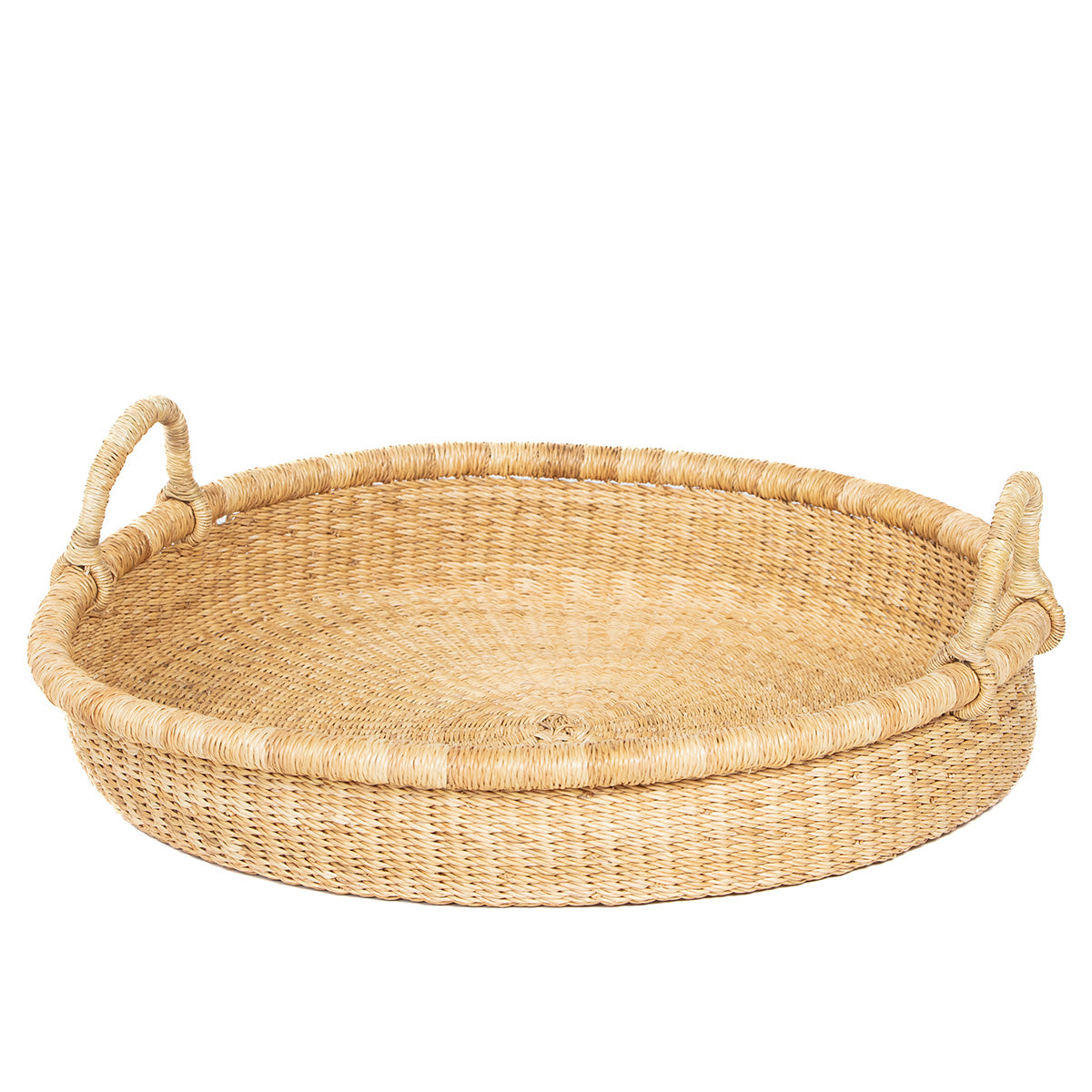 The Bolga bowl is a beautifully handwoven piece, crafted from sustainable elephant grass, perfect for adding natural elegance to your home. This medium-sized bowl is ideal for tabletop storage, making it perfect for holding fruits, bread, or small household items.